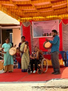 The Better World Shelter team welcoming the gathering with the beats of the parai drum